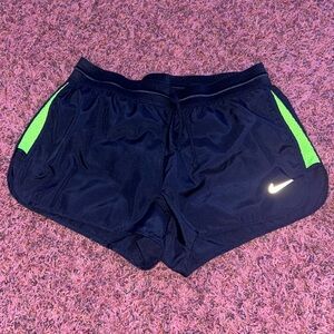 Nike Dri-Fit shorts. Navy blue with neon green